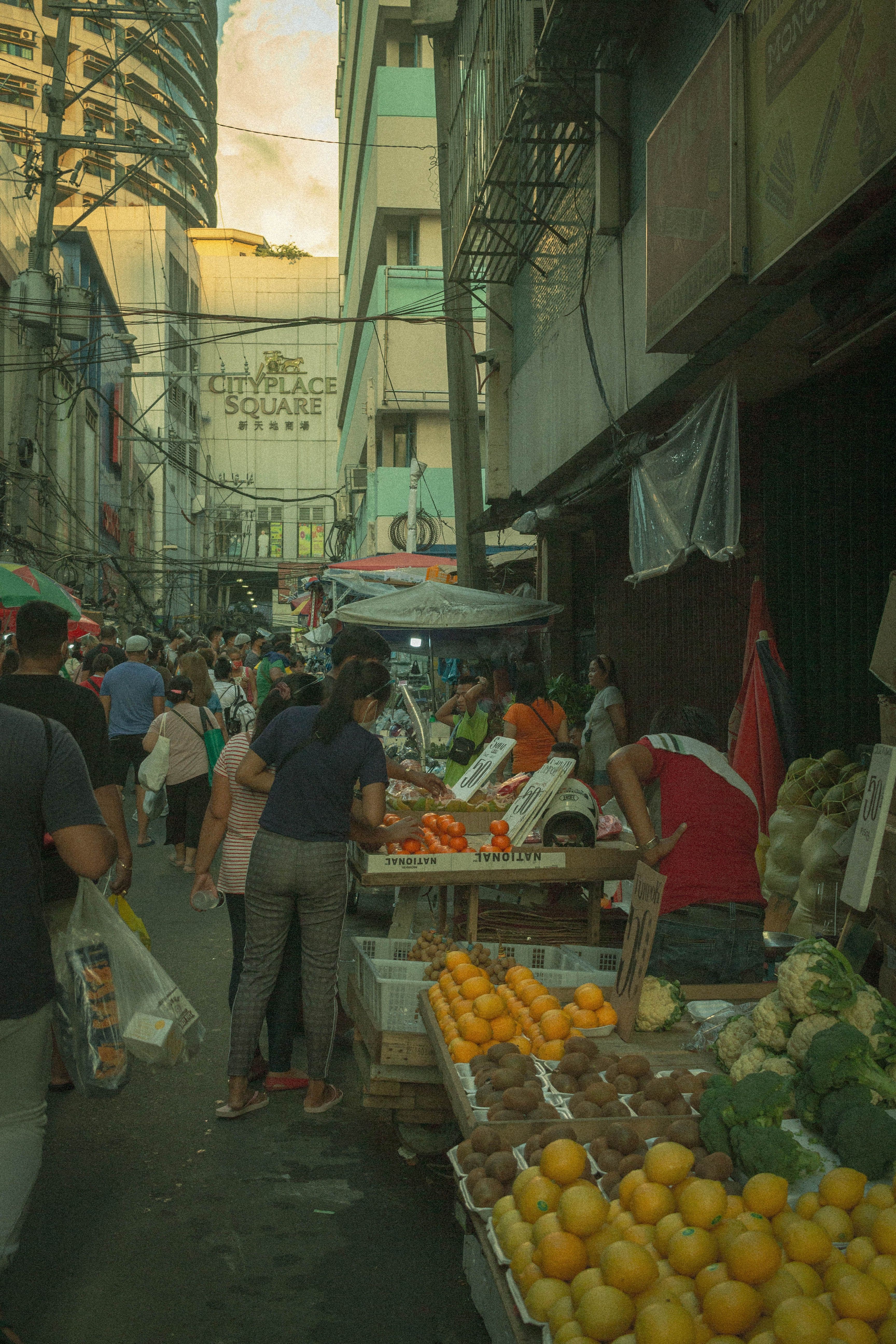 Busy African market street at golden hour